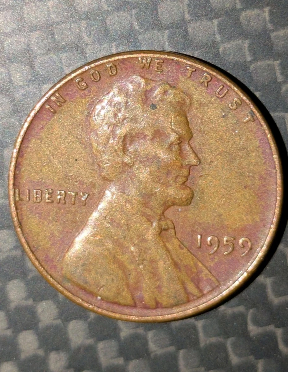 1959 penny BIE die break showing raised metal lump between B and E in LIBERTY inscription